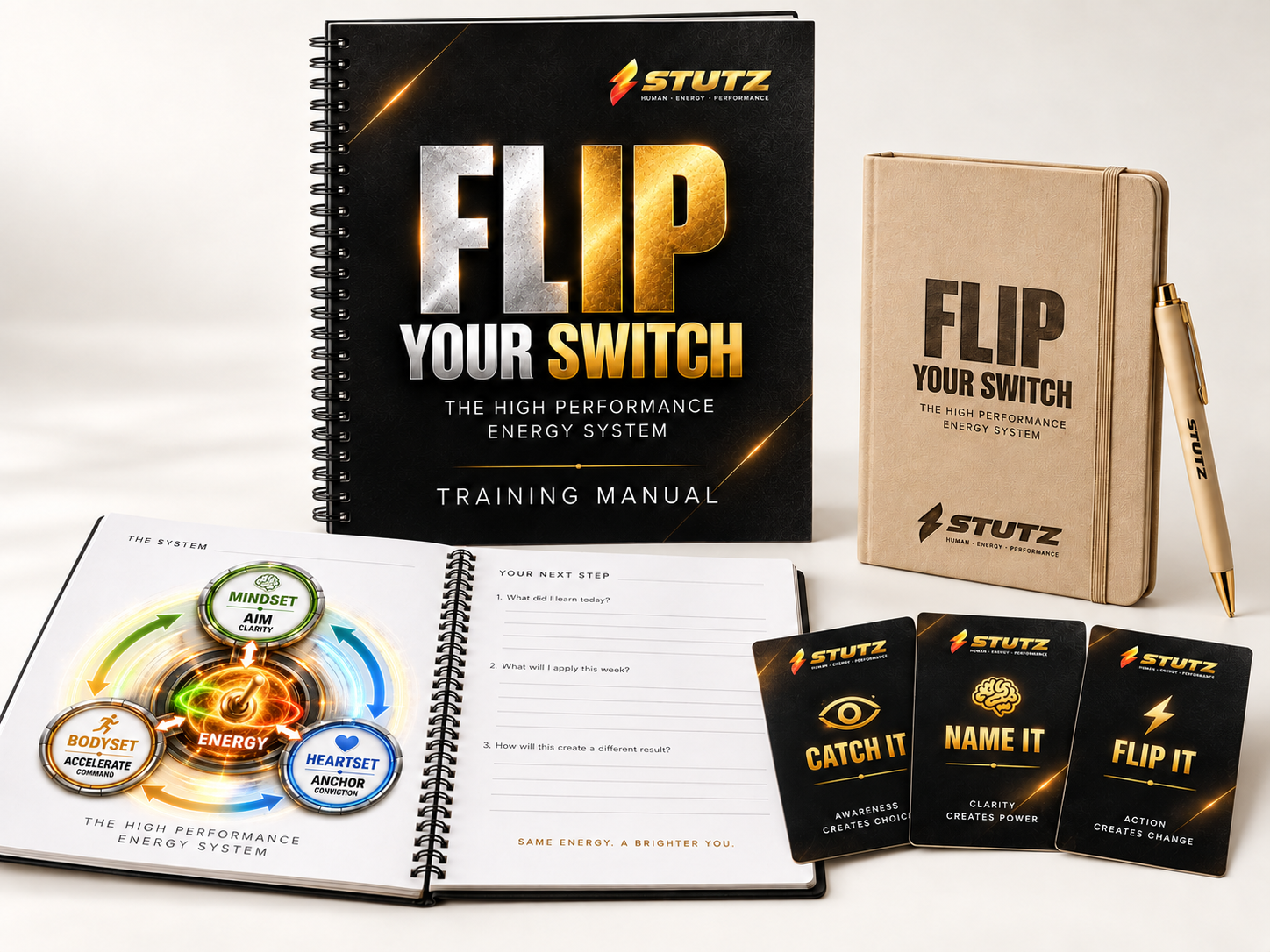 Training kit concept with a closed and open manual, fanned practice cards, a light tan notebook, and a matching pen