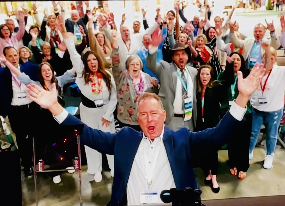 Jeff sharing an energetic moment with a group